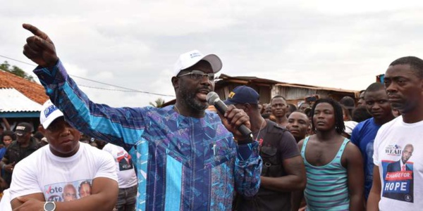 Au Liberia, l’ancienne gloire du football George Weah, candidat des défavorisés Au Liberia, l’ancienne gloire du football George Weah, candidat des défavorisés