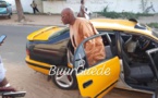 Le ministre Youssou Touré à  bord dans un Taxi