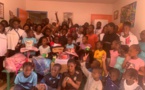 SOUTIENS AUX FAMILLES : Plus de 100 kits scolaires offerts au village d’enfant SOS